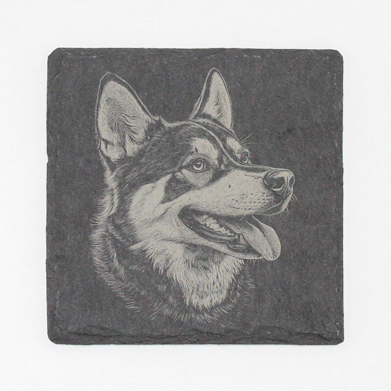 Slate coaster with a engraved dog's face 