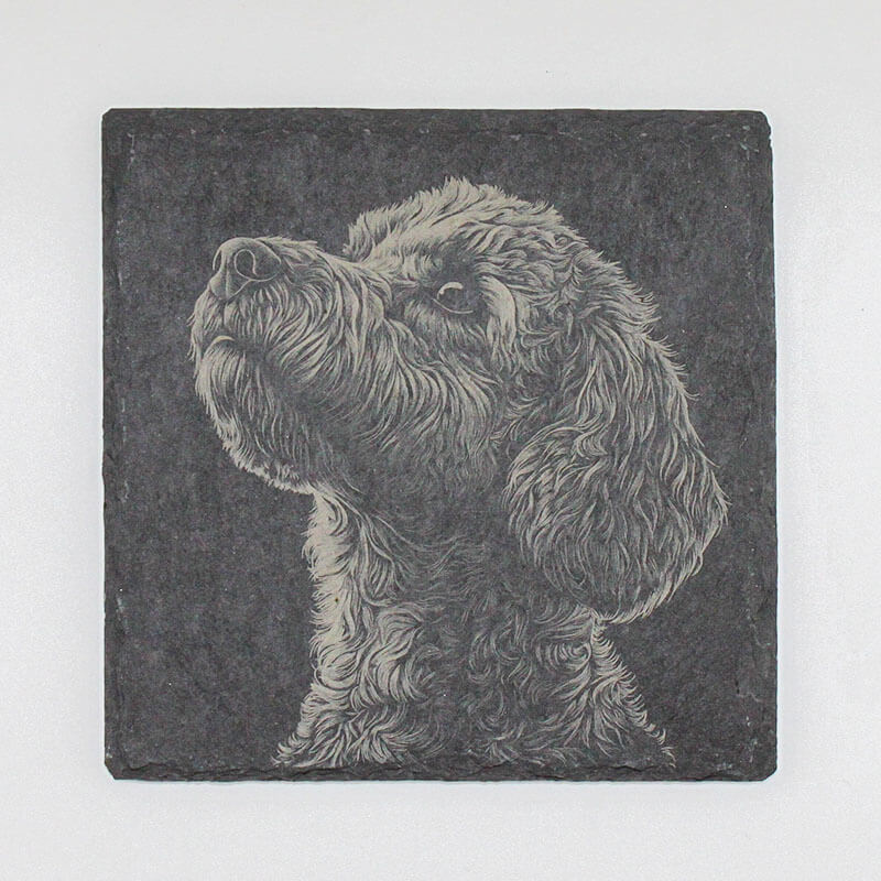 Slate coaster with a engraved portrait of a dog 