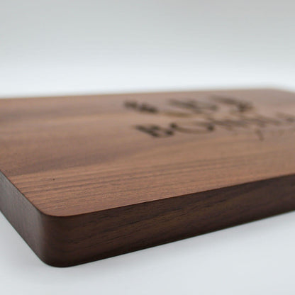 Wooden cutting board with engraved design 