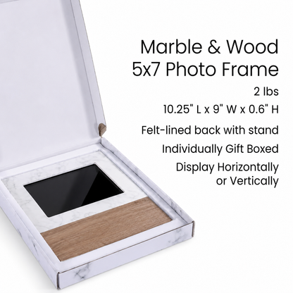 Open marble pattern gift box displaying a marble and wood 5x7 tabletop photo frame with product feature details on a white background